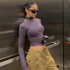 Moda Femenina Estilo Europeo y Americano 2024 Estilo Chica Caliente Deseo Puro Top de Punto con Cuello Semi Alto Ajustado Cremallera Manga Corta Larga