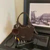 Bolso de mano estilo coreano para mujer, nuevo modelo principios de otoño 2026, bolso de cubo con estampado de leopardo de alta costura, nicho, para hombro