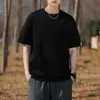 Camiseta básica de manga corta de color liso para hombre, nuevo modelo 2026, cuello redondo, moderna y sencilla, con logo en la manga, fina y holgada para verano