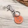 Estilo Europeo y Americano Popular Retro Literario y Artístico Unisex Aleación de Bronce Cuero Llavero Cuero Genuino Pequeño Regalo