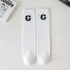 Calcetines largos para niños para primavera y otoño, calcetines de media pantorrilla con estampado de letras unisex, calcetines de baile callejero de moda para niños, populares en redes sociales, calcetines deportivos para la pantorrilla