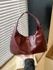 Bolso de hombro de luna tachonado con diseño de nicho estilo coreano, nuevo estilo moderno y genial 2026, bolso de mano con correa ancha para el hombro, bolso de axila