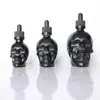 Superventas transfronterizo en stock: varios colores de botellas de perfume al por mayor con forma de calavera de 30 ml, botellas de cáñamo, botellas pequeñas de aceites esenciales, vidrio para manualidades