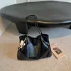 Bolso tote minimalista de nicho Shuai Mi Jia para mujer, nuevo modelo otoño 2026, de gran capacidad, casual, para ir al trabajo, de hombro y debajo del brazo