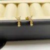 Nuevos Pendientes de Lujo con Cierre de Tornillo "Serie Mariposa" Chapados en Oro Real, de Venta Caliente