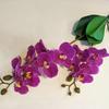 Suministro al por mayor de película Dos tenedores con hojas simulación pequeña mariposa orquídea ramo de flores falsas flores artificiales una generación de cabello