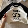 Camiseta de manga larga de algodón puro para niños y niñas, camiseta base de dibujos animados bordada con flock para niños 2026, adecuada para primavera y otoño