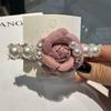 Celebridad en línea elegante estilo coreano para ir al trabajo OL Perla Camelia grande lazo pinza de resorte dulce lindo retro accesorios para el cabello al por mayor