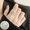 Anillo retorcido de líneas geométricas entrelazadas para mujer, multicapa, exquisito, versátil, anillo abierto de nuevo estilo, anillo creativo para el dedo índice