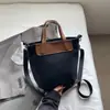 Bolso Pequeño Retro de Moda Transfronterizo para Mujer, Nuevo Bolso Cruzado para Teléfono Primavera y Otoño 2026, Bolso Cubo Marrón de Alta Gama