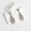 Pendientes Amazon transfronterizos, extragrandes, electrochapados, elegantes, de estilo largo, con un toque de alta gama, adornados con borlas y pedrería negra