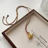 Collar Largo con Cuerda Trenzada y Colgante de Elefante Dorado para Mujer, Retro, Lujo Ligero, Diseño de Nicho, Cadena para Suéter, Accesorios de Alta Gama