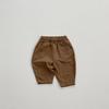 Ins versión coreana de pantalones de color sólido diseño de parche en la rodilla pantalones con bolsillos bebé niños y niñas primavera y otoño combinan con todo transpirable ropa infantil