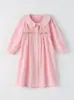Vestido de manga larga infantil transfronterizo 2026 otoño/invierno estilo europeo y americano para niña pequeña y joven vestido con cuello de muñeca venta al por mayor