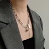 Nuevos accesorios de cadena de acero de titanio etiqueta de bola pequeña cadena de suéter de personalidad estilo frío INS celebridad de Internet colgante hip hop producto de moda