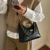Bolsa de Ombro Acolchoada Estilo Chanel, Simples e Versátil, Nova Cor de Moda 2026 Bolsa Tote Transversal com Corrente para Ombro