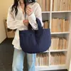 Primavera 2026 Novo Estilo Minimalista Japonês Bolsa de Mão Feminina Suave e Elegante Bolsa Tote Pequena Versátil Simples e Sofisticada