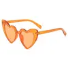 Moda novo amor óculos de sol femininos moda europeia e americana dobradiça dente coração de pêssego óculos de sol óculos personalizados fábrica atacado