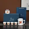 Set de Té de Jade Estilo Chino de Alta Gama Cerámica Una Tetera Cuatro Tazas Evento de Reunión Anual de Empresa Regalo de Negocio