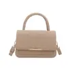 Bolsa pequena quadrada texturizada transfronteiriça da moda para mulheres, novo modelo outono 2026, bolsa de ombro de cor sólida com padrão de pedra, bolsa transversal estilosa