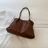 Bolso tote minimalista de estilo coreano con un aire relajado, color liso, nueva colección otoño 2026, gran capacidad, adecuado para el trabajo y los desplazamientos, bolso de hombro o bolso de axila