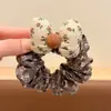 Scrunchie Estilo Coreano com Laço e Estampa de Flores para Mulheres 2026 Novo Estilo Elástico de Cabelo para Coque Elástico Alto Corda de Cabelo Acessório de Cabelo