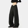 Pantalones negros de pierna ancha para hombre con diseño de raya de planchado central, cintura elástica, corte holgado, caída fluida y estilo casual hasta el suelo.
