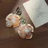 Nuevos aretes de flor de gardenia estilo chino para mujer, ambiente de verano junto al mar, aretes frescos y únicos