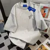 Camiseta Redonda de Manga Curta com Estampa Divertida de Desenho para Mulheres Moda Verão 2025 Versátil Estilo Casal Top Oversized