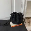 2026 Nuevo Bolso Cubo Retro Milenial con Borlas para Mujer Bolsa Pequeña Esmerilada con Cordón Bolso Cruzado de Hombro Único de Nicho