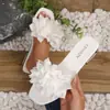 Sandalias planas para mujer para comercio exterior, nuevo modelo de verano 2026, punta abierta y puntera cuadrada, diseño floral moderno, sandalias de playa versátiles