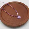 Nova corrente de clavícula de contas de arroz estilo flor margarida coreana estilo menina doce corrente de clavícula de praia com contas