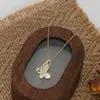 Corrente Elegante para Clavícula Banhada a Ouro Real com Zircônias Microcravejadas Design de Nicho Feminino Colar de Concha Borboleta Corrente Exquisita para Suéter