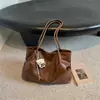 Bolsa Tote de Moda Tendência 2026 Outono Nova Vintage Feminina de Ombro Grande Capacidade Texturizada para o Dia a Dia Bolsa de Axila