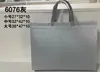 Bolsa no tejida de color spot recubierta con prensado en caliente bolsa de regalo publicitaria bolsa de compras de ropa no tejida portátil impresión de logotipo