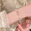 Pulseira de Flor com Contas de Cristal Branco com Cordão Ajustável Pulseira de Luxo Leve com Toque de Alto Padrão Moda Versátil Design de Nicho Joia de Mão