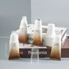 Cabezal de Masaje Metálico Estriado Hecho a Medida de Fábrica Material de Empaque de Tubo Suave Empaque de Crema para Arrugas de Cuello con Aceite Esencial Tubo Cosmético Tubo Suave Estriado