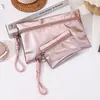 Nuevo bolso de mano de PU con purpurina de alta gama transfronterizo, bolsa de maquillaje, monedero, bolsa simple para guardar lápiz labial y tarjetas, bolsa para teléfono