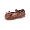 Sandalias para Niñas 2026 Verano Nuevo Estilo Lazo Infantil Versátil Zapatos de Princesa Niñas Pequeñas Suela Suave Huecas Zapatos Individuales Modernos