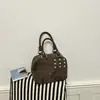 Bolso de Mano con Remaches Sencillos Transfronterizo Estilo Coreano para Mujer Bolso Cruzado de Hombro Único Bolso de Motocicleta de Moda Nuevo Estilo 2026