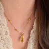 Xiaohongshu Más Vendido Nuevo Estilo Chino Anillo de Correr Forma de Cacahuete Cristal Amarillo Pulsera Collar Conjunto de Joyería de Ojo de Gato Venta al por Mayor