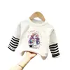 Top de estilo patchwork de dos piezas falsas, moderno y a la moda, para niñas, camiseta de manga larga a rayas de algodón puro con dibujos animados