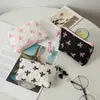 Bolsa de Cosméticos Nueva de Gran Capacidad Transfronteriza, Bolso de Mano con Lazo, Neceser Portátil, Bolsa de Almacenamiento para Cosméticos de Mujer, Lápices Labiales