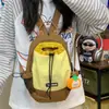 Mochila pequena com cordão e color block inspirada em dopamina, estilo coreano, perfeita para estudantes, férias, atividades ao ar livre e acampamento; também pode ser usada como bolsa transversal