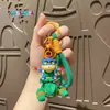 Venta caliente original crayón pequeño nuevo dinámico nueva dimensión muñeca llavero colgante de bolsa llavero de coche al por mayor