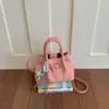 Bolso tipo cubo versátil para el verano 2026, simple y único, nuevo bolso de mano de moda, estilo coreano, bandolera de un solo hombro
