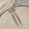 Pendientes largos con borla de nudo para mujer 2024 nuevo estilo popular pendientes de temperamento único pendientes de lujo ligero de alta gama de nicho