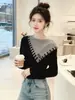 Suéter de punto irregular de dos piezas estilo retro americano para mujer, nuevo modelo primavera, otoño, invierno 2026, suéter base holgado y favorecedor