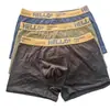 Cuecas Boxer de Algodão Cor Sólida Masculinas, Cintura Média Moderna com Costuras Visíveis, Estilo Exportação, Atacado Direto da Fábrica de Guangdong Liquidação de Estoque
