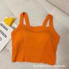 Camisola deportiva de algodón de color liso con escote en V y copa fija con efecto push-up y espalda descubierta.